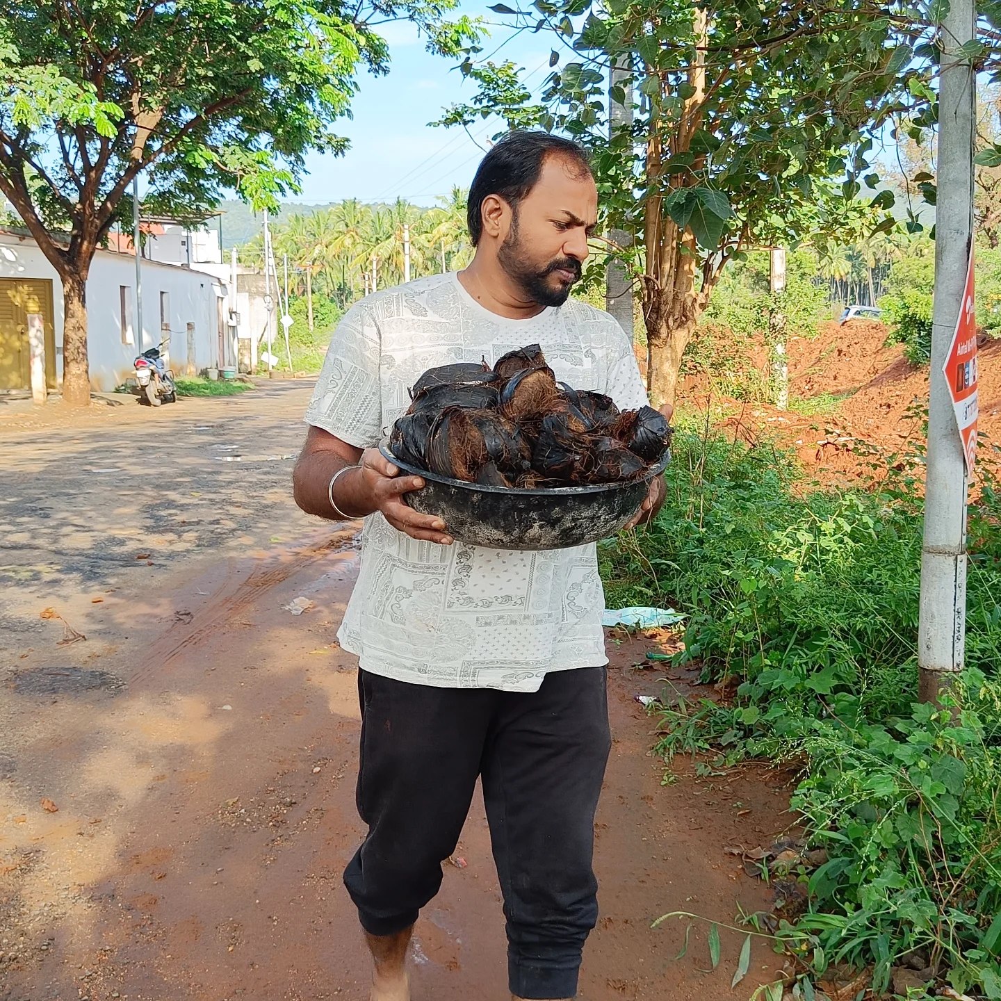 Aaniver Organization volunteers planting palm seeds in Somayampalayam, Coimbatore